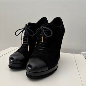 Chanel shoes: suede outer, black leather toe.